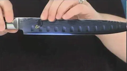 Shun - Classic 9" Slicing Knife With Hollow Ground Blade  SKU#:7494016